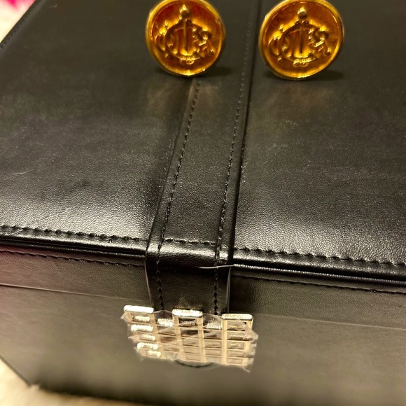 Christian Dior Iconic Monogram Clip Earrings on a Soft Texture Background - Picture 2 of 4